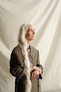Elderly Woman Holding Wrinkled Hands