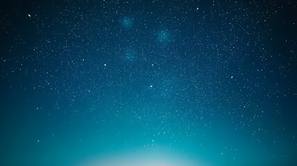 Obraz premium Night Sky with Stars and Soft Gradient Background in Deep Blue and Black Hues