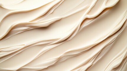 An artistic representation of creamy swirls on a soft surface, evoking a sense of warmth and elegance, making it suitable for various creative applications.