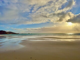 Fototapeta premium A beautiful beach scene at St. Brelade’s Bay, Jersey, Channel Islands. 