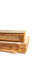 two obsolete books stacked isolated on white background, abstract vintage backdrop
