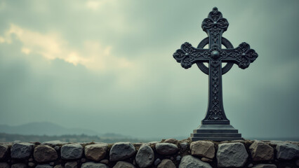 Ancient stone cross standing on a rock wall against dramatic sky.