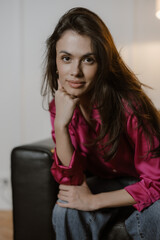 Fototapeta premium Motivated woman looking into camera. Portrait of a business lady.