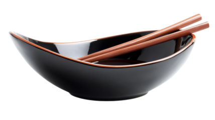 Elegant black bowl with wooden chopsticks arranged neatly for a dining experience