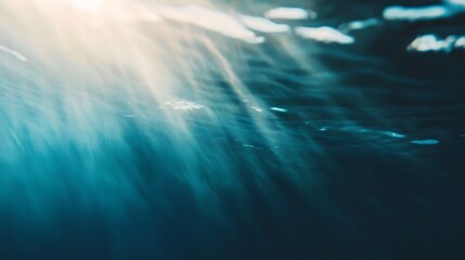 Cerulean Undersea Illumination A cinematic ethereal close up of water at sunset with layers of motion blur film grain and depth of field creating a dreamlike abstract underwater scene