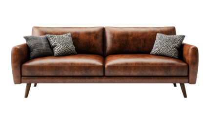 Modern brown leather sofa with decorative pillows in a stylish living room setting