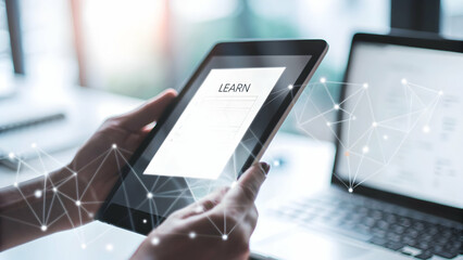 Revolutionizing Learning: Hand Holding Tablet with Holographic Education App in Modern Home Office Setup - Zooming into the Future of Education with Glowing Elements