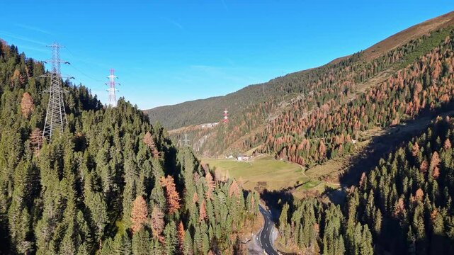 Aerial flight through K&uuml;htai valley in Tirol, Austria during autumn