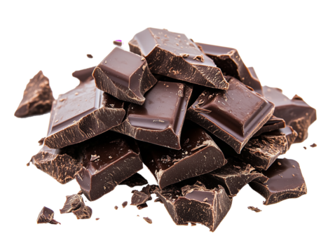 Pieces of dark chocolate arranged in a scattered pile showcasing smooth textures and rich colors