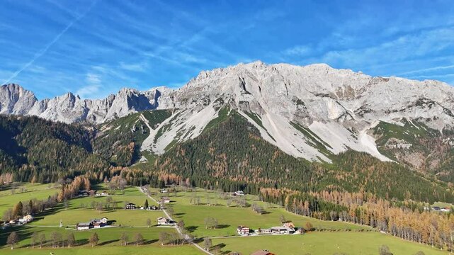 Aerial view of Ramsau village in the Ennstal valley in Styria, Austria on a beautiful autumn day