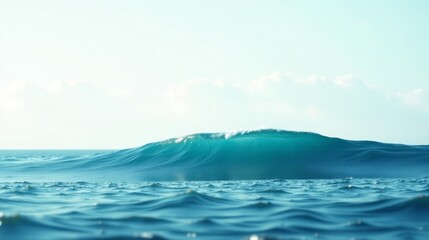 Naklejka premium Serene Ocean Wave Rolling Across a Tranquil Seascape Under a Bright Sky