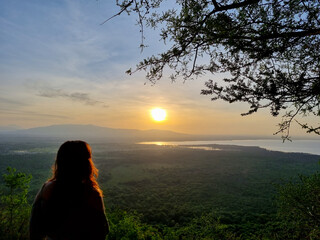 A Beautiful and Serene Sunset Perfectly Overlooking a Vast and Breathtaking Landscape Lake Manyara...