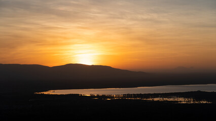 A Serene Sunset Over Hills and Water with Beautiful Colors and a Dreamy Atmosphere Lake Manyara Tanzania Africa