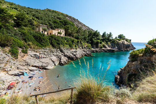 Ieranto Bay Beach in Massa Lubrense, a FAI (Italian National Trust) earthly paradise with crystal-clear blue waters and a view of Capri. Naples, Italy.