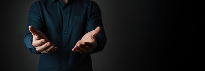 Man extending empty hand open for help support and welcome concept with copy space.