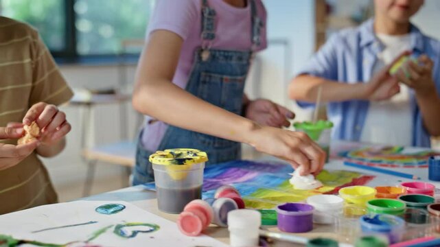 Children creating colorful crafts at art workshop closeup. Pupils artclass 