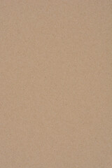 A close-up, flat lay shot of a plain brown paper surface, showcasing its texture and natural color
