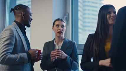 Two colleagues share a conversation while gossiping about a third coworker, who remains unaware. Concept of workplace gossip, office dynamics, and informal communication - Powered by Adobe