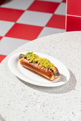 Appetizing hotdog with cucumber and jalapeno