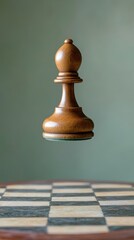 A Wooden Chess Piece Bishop Hovering Over A Checkered Board