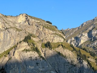 Rocky alpine peaks above Lake Melchsee or Melch Lake in the Uri Alps mountain massif, Kerns - Canton of Obwalden, Switzerland (Kanton Obwald, Schweiz)