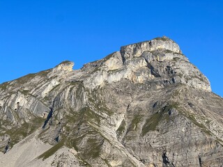 Rocky alpine peaks above Lake Melchsee or Melch Lake in the Uri Alps mountain massif, Kerns - Canton of Obwalden, Switzerland (Kanton Obwald, Schweiz)