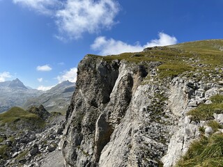 Rocky alpine peaks above Lake Melchsee or Melch Lake in the Uri Alps mountain massif, Kerns - Canton of Obwalden, Switzerland (Kanton Obwald, Schweiz)
