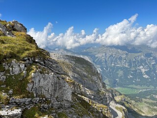 Rocky alpine peaks above Lake Melchsee or Melch Lake in the Uri Alps mountain massif, Kerns - Canton of Obwalden, Switzerland (Kanton Obwald, Schweiz)
