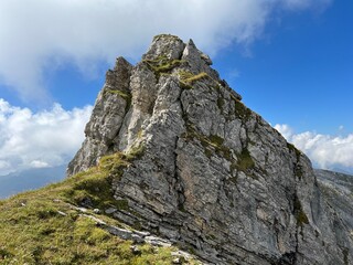 Rocky alpine peaks above Lake Melchsee or Melch Lake in the Uri Alps mountain massif, Kerns - Canton of Obwalden, Switzerland (Kanton Obwald, Schweiz)