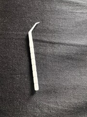 Plastic toothpick on black 