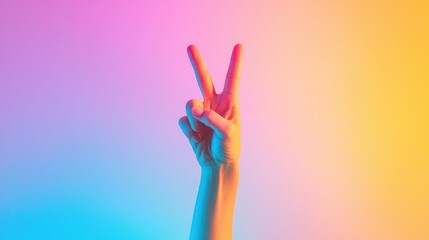 A single hand showing a peace sign isolated against a gradient pastel background.