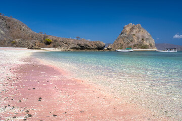 Come and explore this stunning Pink Beach, featuring silky pink sand and breathtaking turquoise...