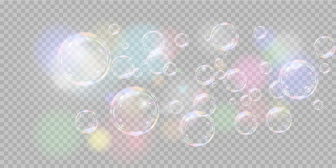 Soap bubbles on a transparent background. Bokeh light glows like a rainbow. EPS 10 vector.