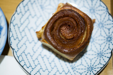 A freshly baked cinnamon bun pastry. Top view