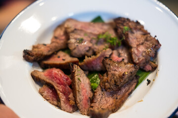Thai slice of juicy grilled beef. Thai food style for eating with Somtum. Thai grilled beef brisket