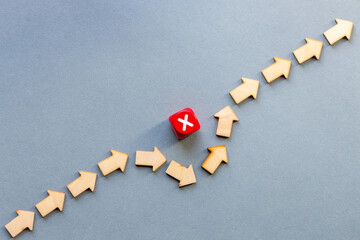Arrow symbols bypassing threats in pursuit of the goal. Concept Avoid problems and find the optimal...