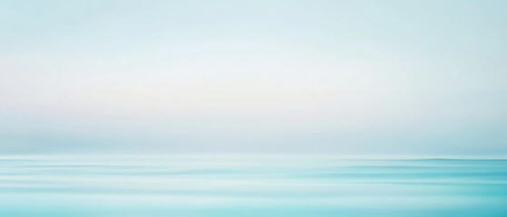 Obraz premium Calm ocean water with gentle waves, minimalist abstract background of serene blue tones and soft pastel hues under a clear sky. Peaceful coastal landscape.