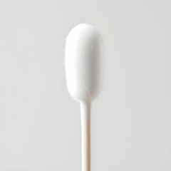 "Close-Up of a Cotton Swab on a Minimalist Background"