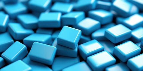 A detailed close-up view of a stack of blue cubes arranged neatly on a wooden table surface.