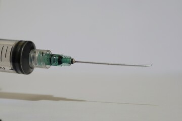 Close-up of a Used Syringe with a Dark Green Residue