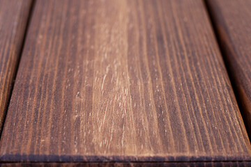 Wooden planks close-up showing smooth texture and natural grain pattern