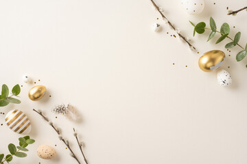 Arrangement of golden and speckled Easter eggs with greenery and branches for celebration