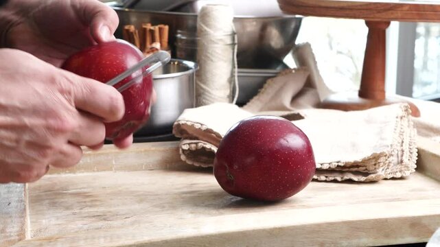Baking apple pie cupcakes with buttercream frosting.  Baking cupcakes in the kitchen with apples and homemade icing.  Apple pie cupcakes instructional video.