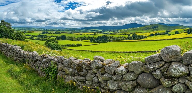 Serene Scottish Highlands Panorama: A Rolling Green Landscape with Stone Wall