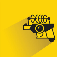 futuristic blaster gun on yellow background