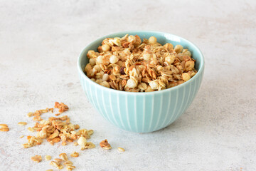 Homemade Granola in a blue Bowl close up
