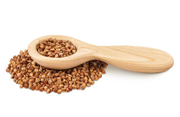Raw buckwheat in wooden spoon isolated on white background
