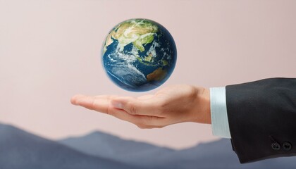 거대한 손 위에 떠 있는 작은 지구