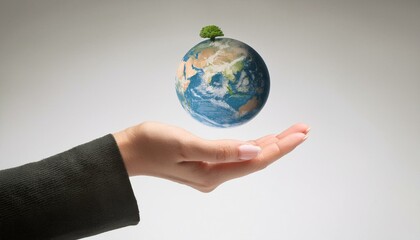 거대한 손 위에 떠 있는 작은 지구