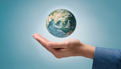 거대한 손 위에 떠 있는 작은 지구